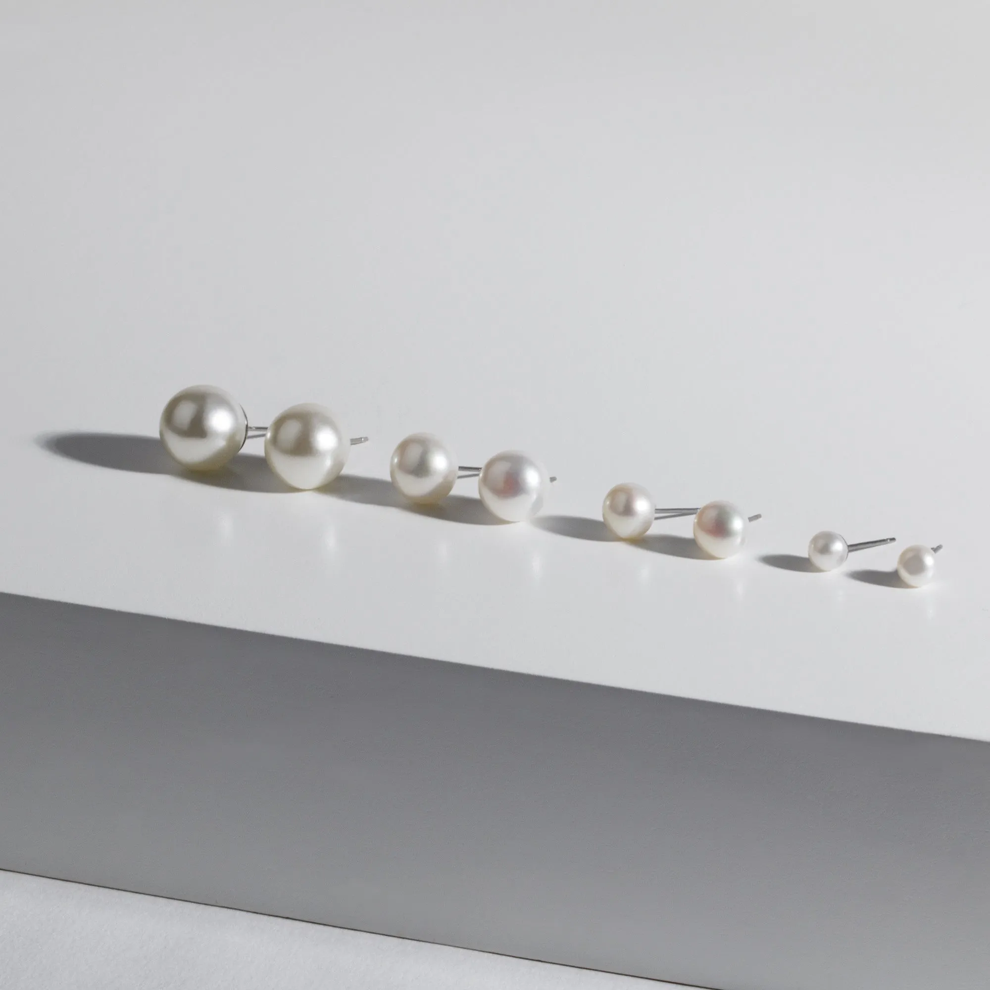 Stainless 12 mm pearl stud earrings